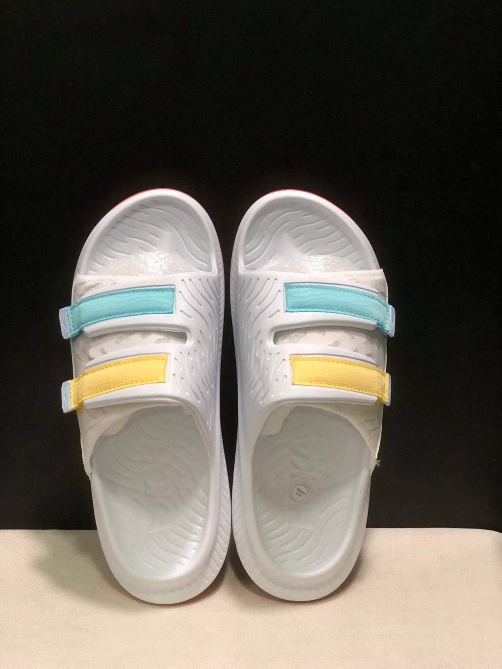 WTAPS x HOKA ONE ONE Ora Luxe Slide Sandals - product image from the listing.