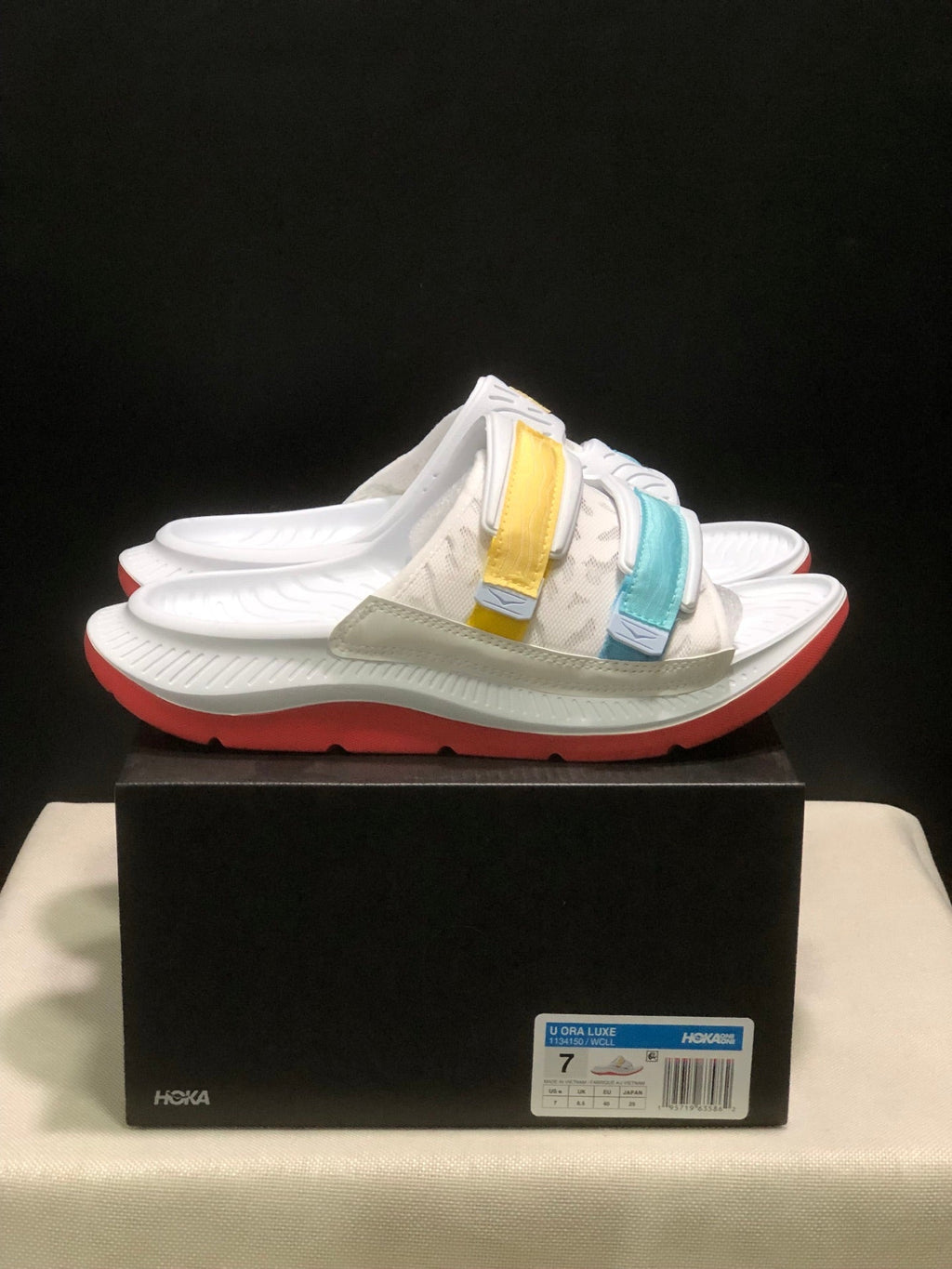 WTAPS x HOKA ONE ONE Ora Luxe Slide Sandals - product image from the listing.
