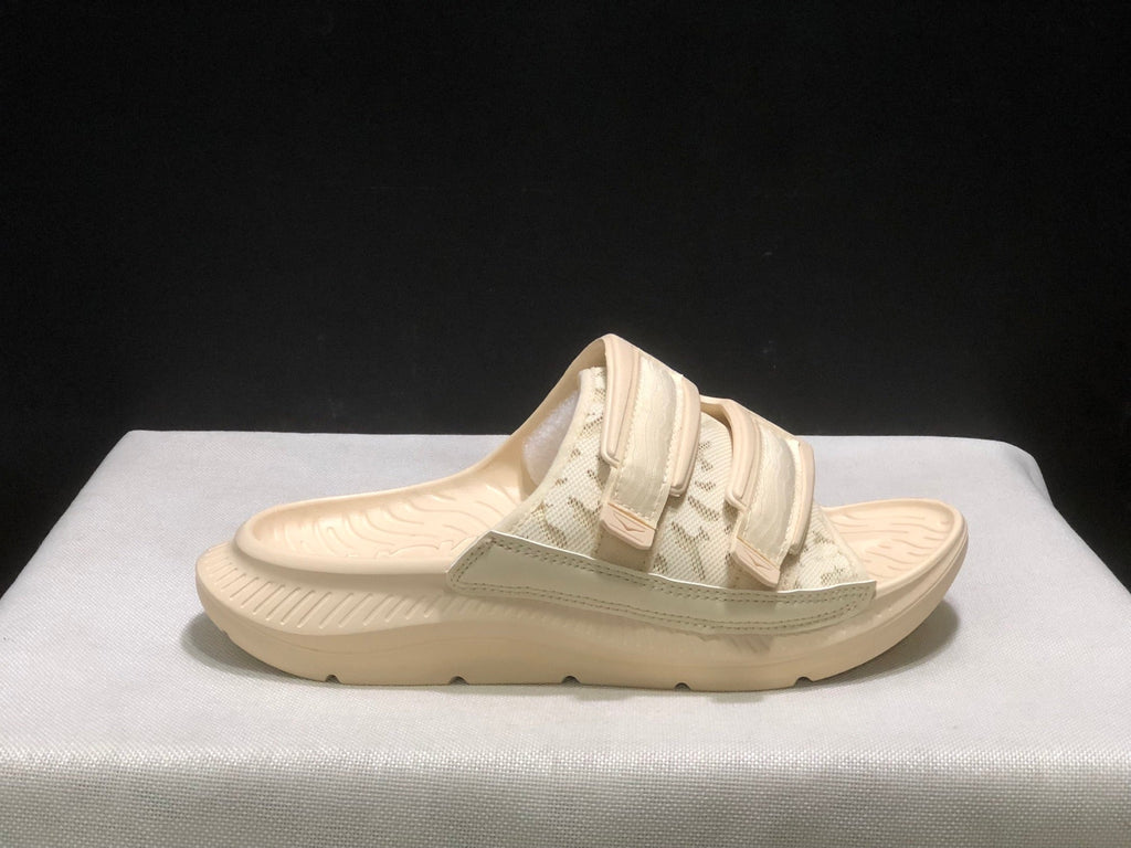 WTAPS x HOKA ONE ONE Ora Luxe Slide Sandals - product image from the listing.